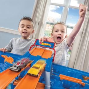 Kids playing with hot wheels